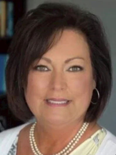 Angie Cox Executive Director